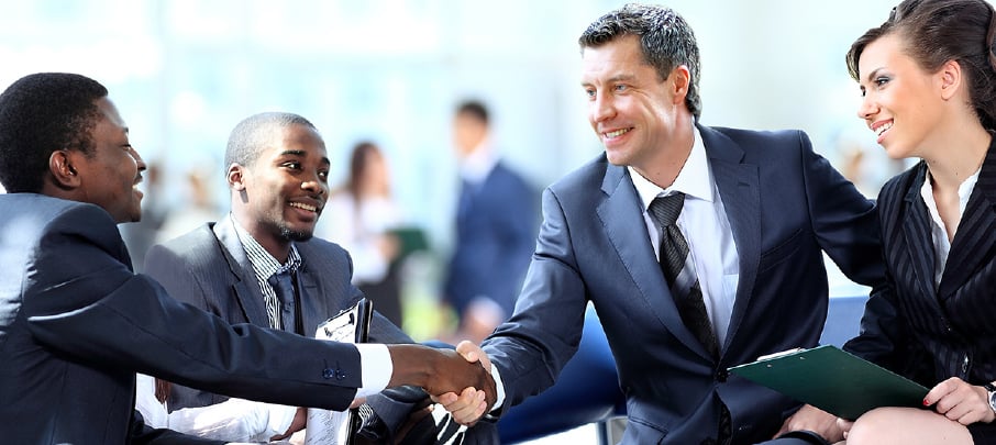 KoppPracticeArea-Four-Business-people-coming-to-agreement-and-handshaking_03